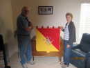 Jim and Cathy holding the Sicilian Banner